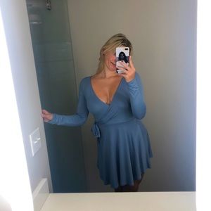 Long sleeved blue wrap dress